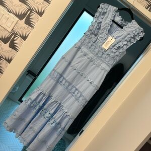 Sacha cotton-linen crochet tiered midi dress in the color blue